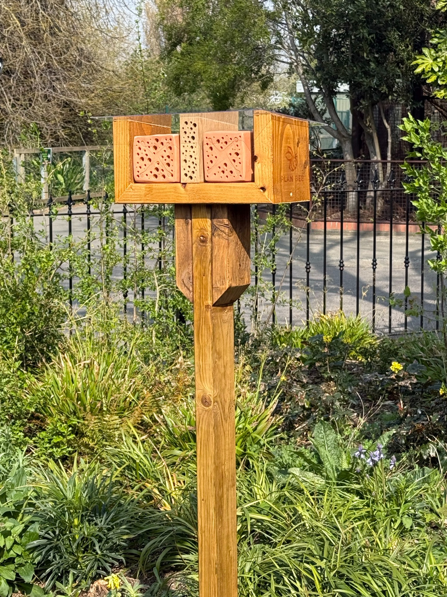 This bee lodge was created for Dublin Zoo. The middle section is made from a piece of hardwood, and the roof is plexiglass to keep the bee stones dry while still allowing sunlight through.